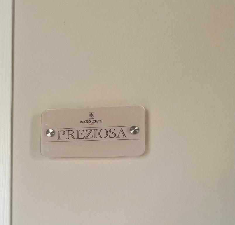 Certifikát, hodnocení, plakát nebo jiný dokument vystavený v ubytování B&B Palazzo Loreto
