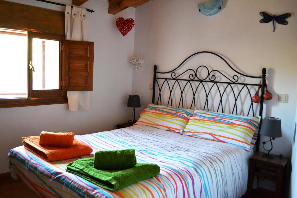 Postel nebo postele na pokoji v ubytování Casa rural La abuela Nines
