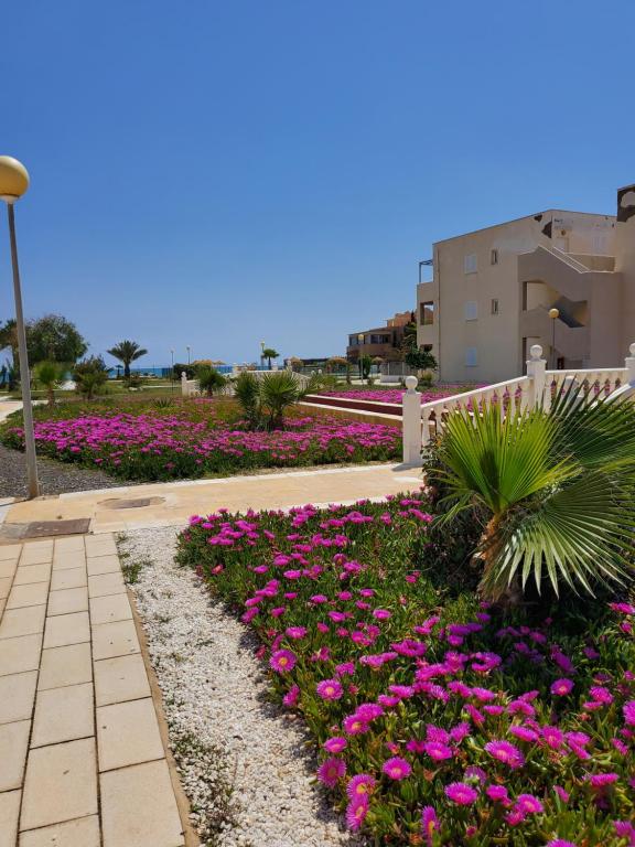 Vonkajšia záhrada v ubytovaní DUPLEX ESPECTACULAR en PRIMERA LÍNEA NATURISTA!