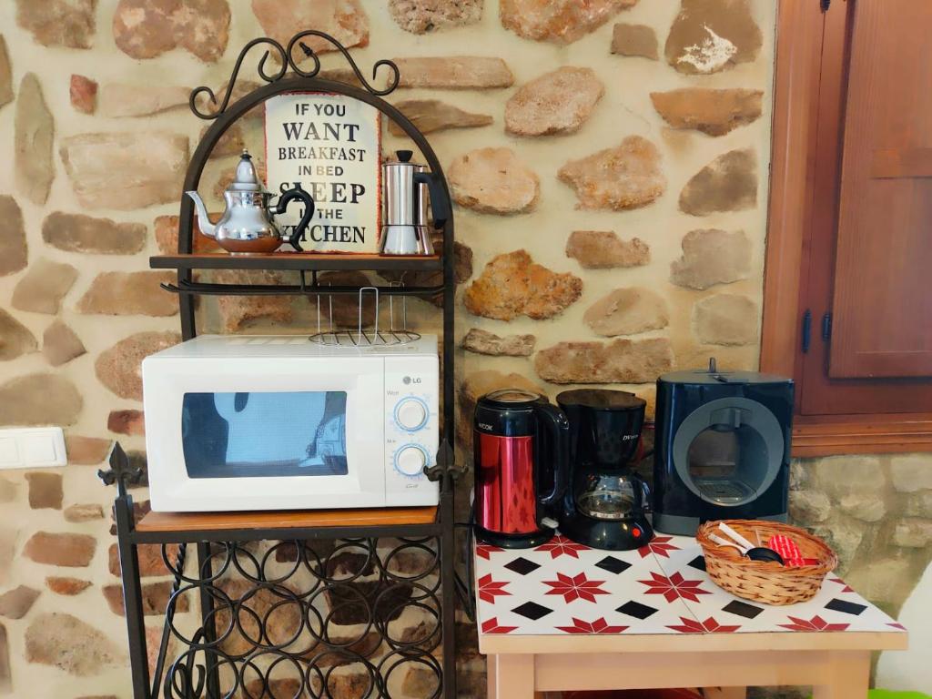 Zestaw do parzenia kawy i herbaty w obiekcie Villa Huerta Nacimiento