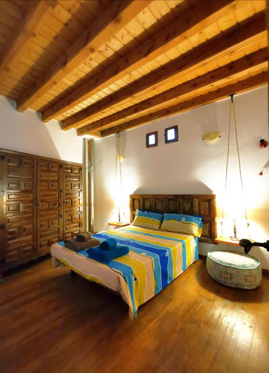 Postel nebo postele na pokoji v ubytování Casa rural La abuela Nines