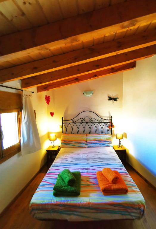 Postel nebo postele na pokoji v ubytování Casa rural La abuela Nines