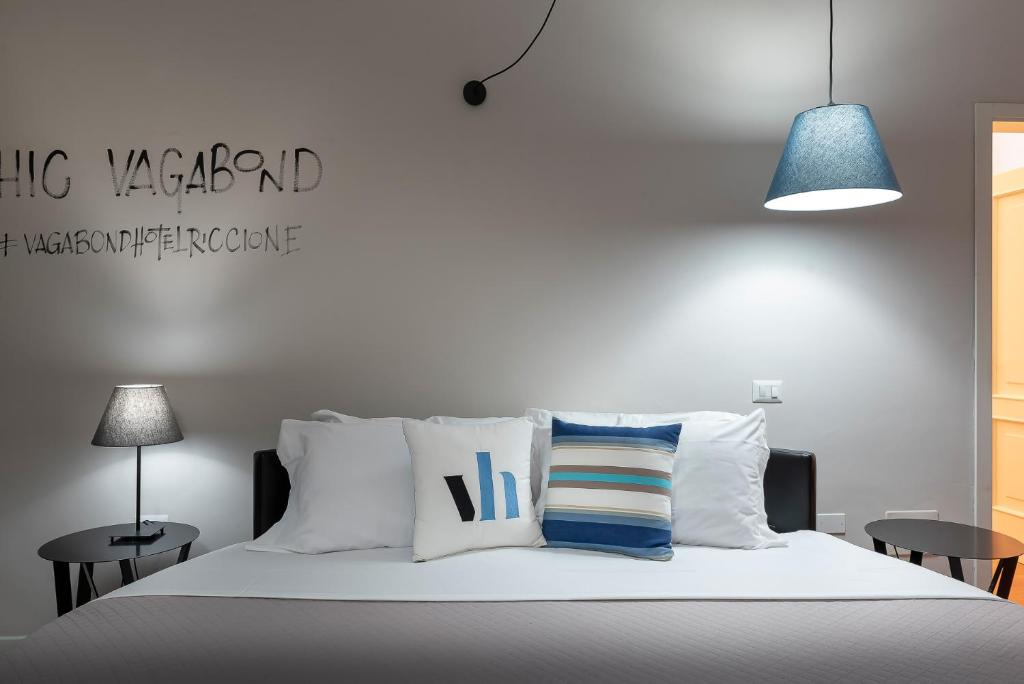 Postel nebo postele na pokoji v ubytování Hotel Vagabond