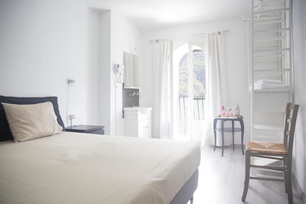 Postel nebo postele na pokoji v ubytování Locanda Gandriese