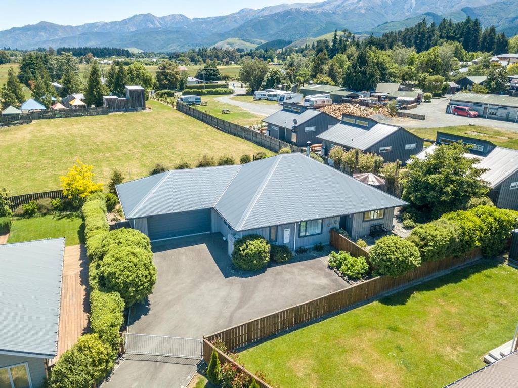 an aerial view of a house with a yard at 5 Hepburn Lane in Hanmer Springs