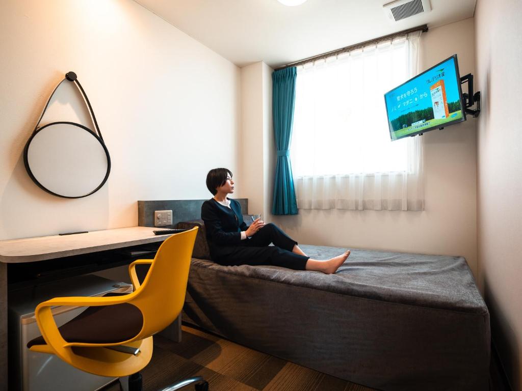 TV a/nebo společenská místnost v ubytování Hotel Area One Ise Inter
