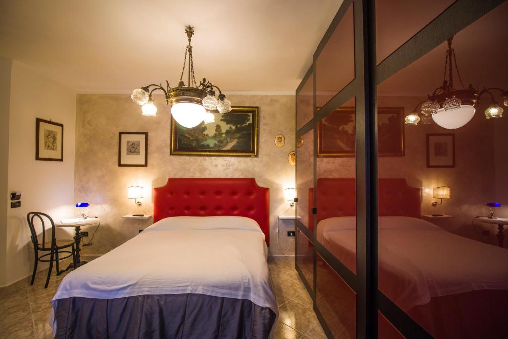 Postel nebo postele na pokoji v ubytování B&B Luxury