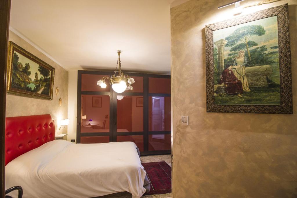 Postel nebo postele na pokoji v ubytování B&B Luxury