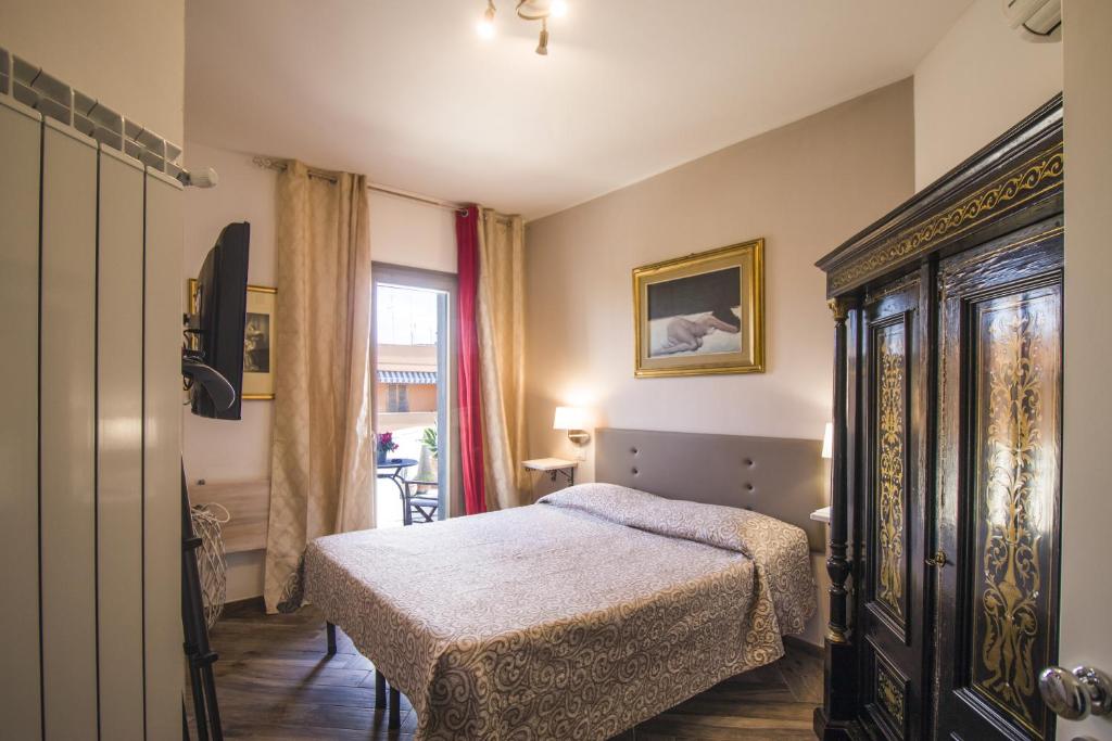 Postel nebo postele na pokoji v ubytování B&B Luxury