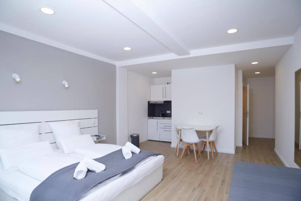 TV a/nebo společenská místnost v ubytování Hamburg Nord Apartments