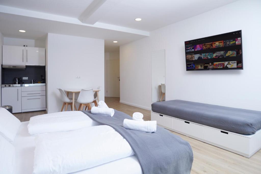Postel nebo postele na pokoji v ubytování Hamburg Nord Apartments
