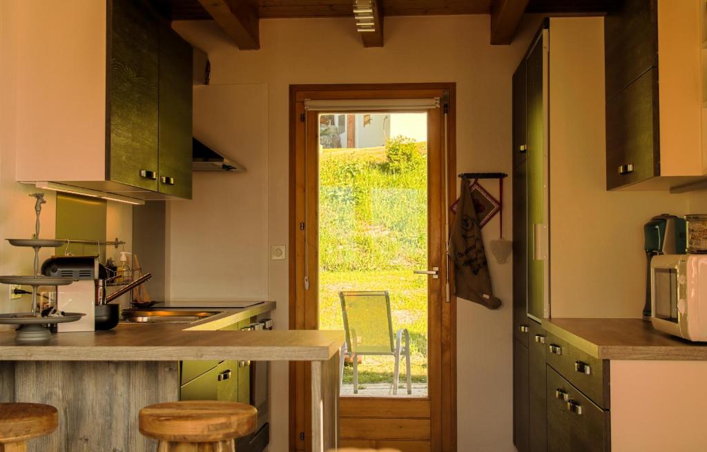 Kuchyň nebo kuchyňský kout v ubytování Chalet Mon Sousou