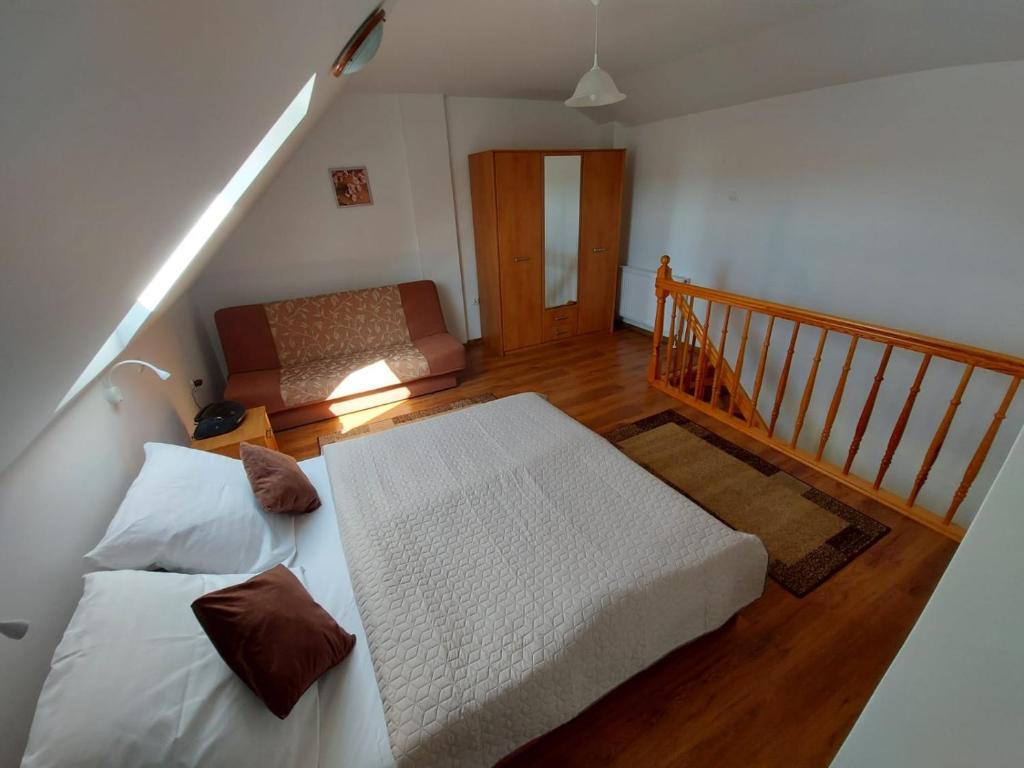Posteľ alebo postele v izbe v ubytovaní Apartamenty Kołczewo