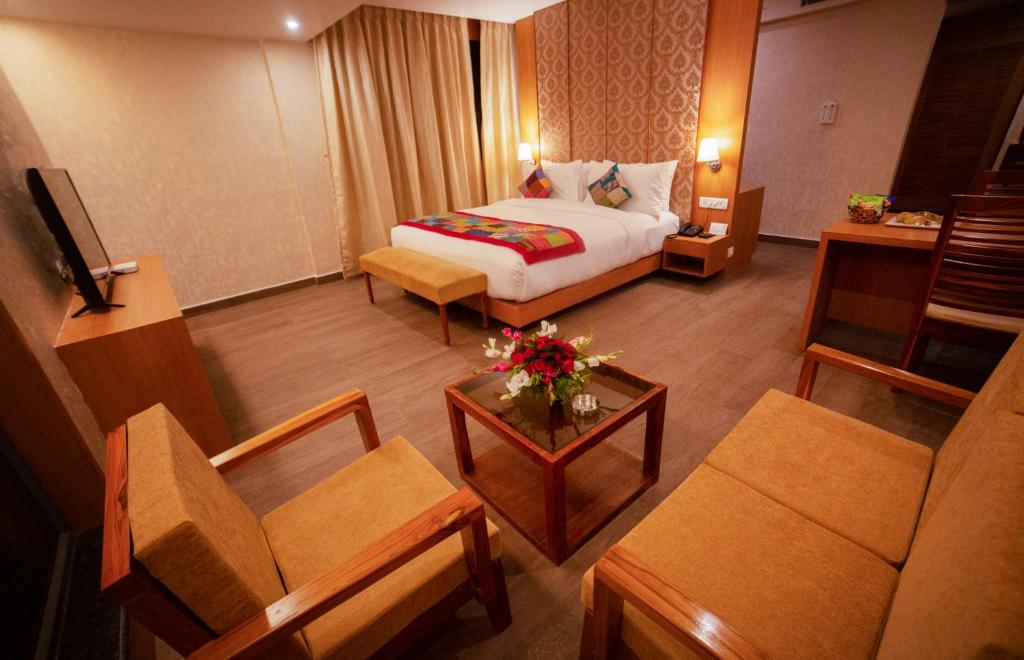 Postel nebo postele na pokoji v ubytování Abhyagama Hotel