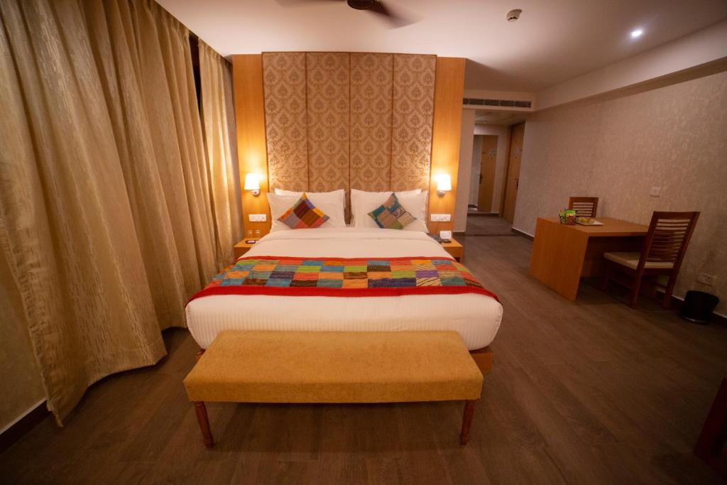 Postel nebo postele na pokoji v ubytování Abhyagama Hotel