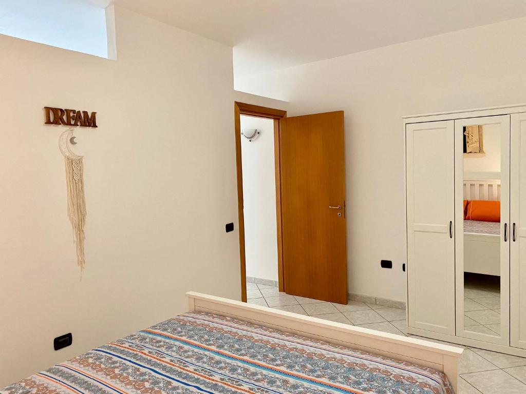 Postel nebo postele na pokoji v ubytování Il Riccio Apartment