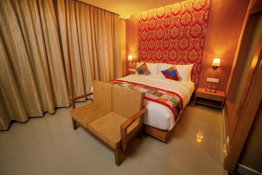 Postel nebo postele na pokoji v ubytování Abhyagama Hotel