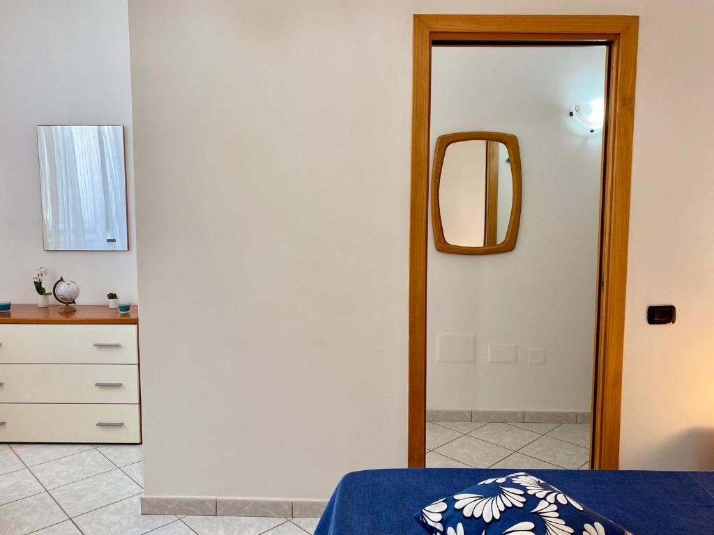 Postel nebo postele na pokoji v ubytování Il Riccio Apartment