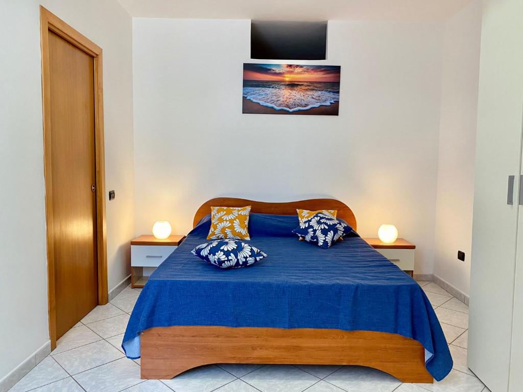Postel nebo postele na pokoji v ubytování Il Riccio Apartment