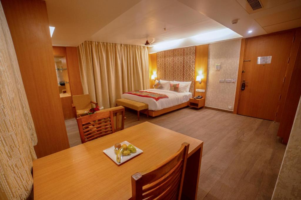 Postel nebo postele na pokoji v ubytování Abhyagama Hotel