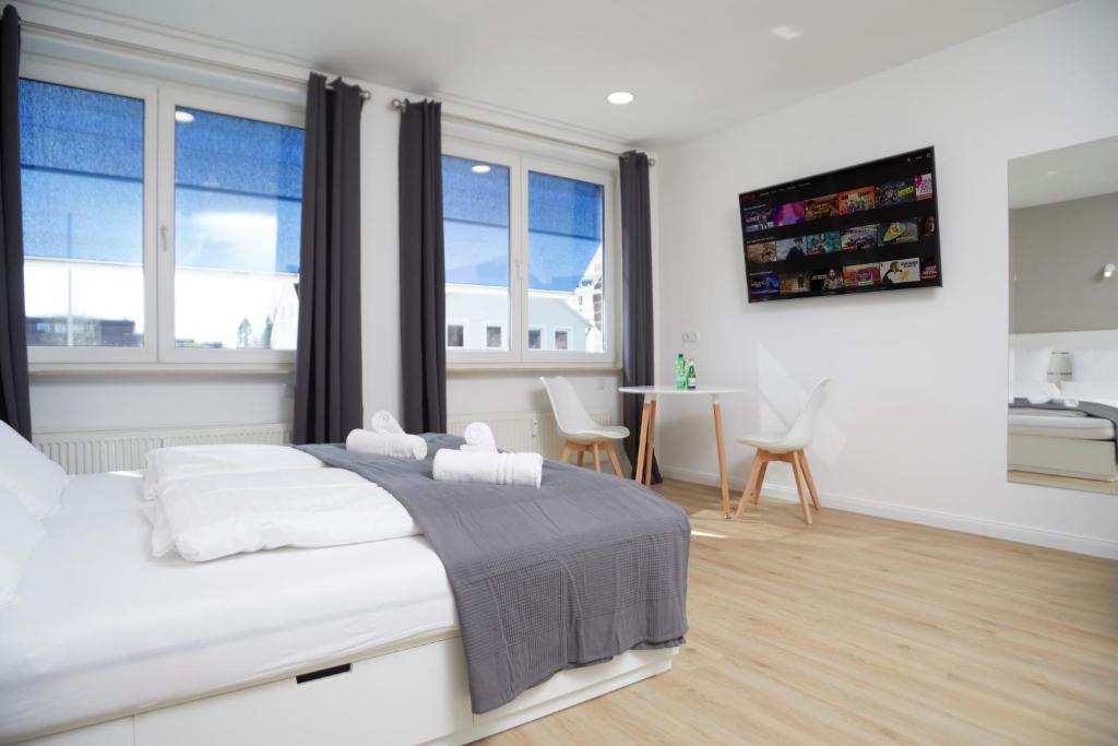 Postel nebo postele na pokoji v ubytování Hamburg Nord Apartments