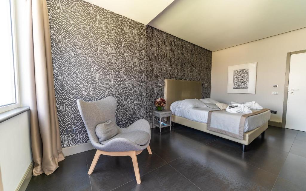 A bed or beds in a room at Hotel Il Gabbiano