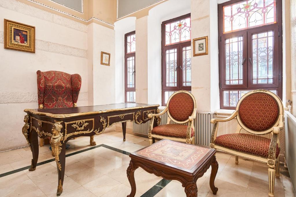 a room with a table and two chairs at Amber Hotel & Spa in Istanbul