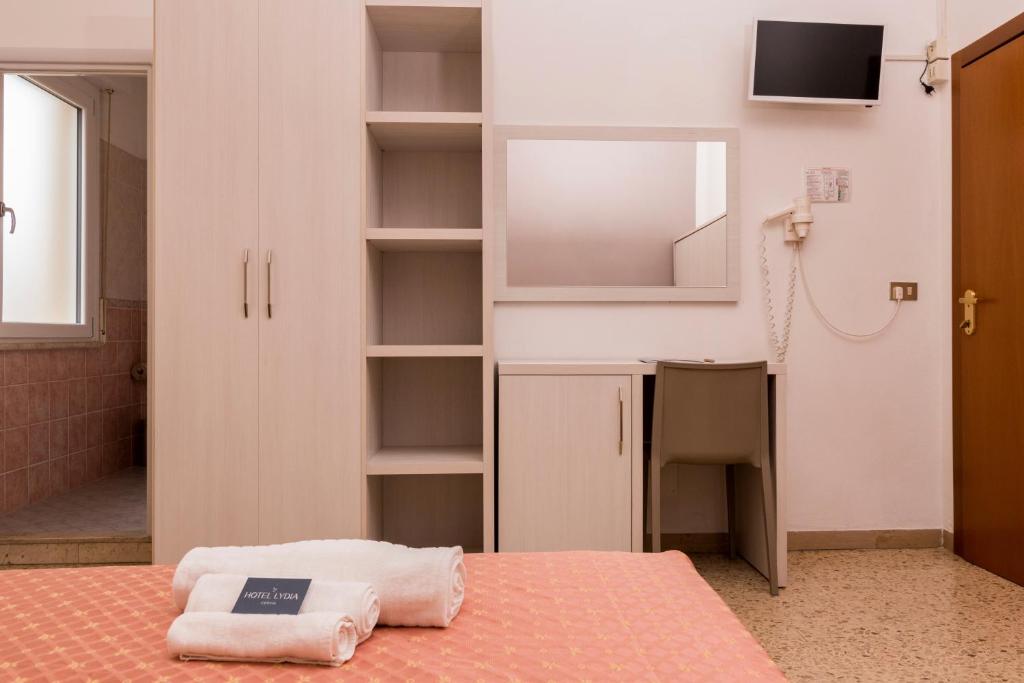 Postel nebo postele na pokoji v ubytování Hotel Lydia