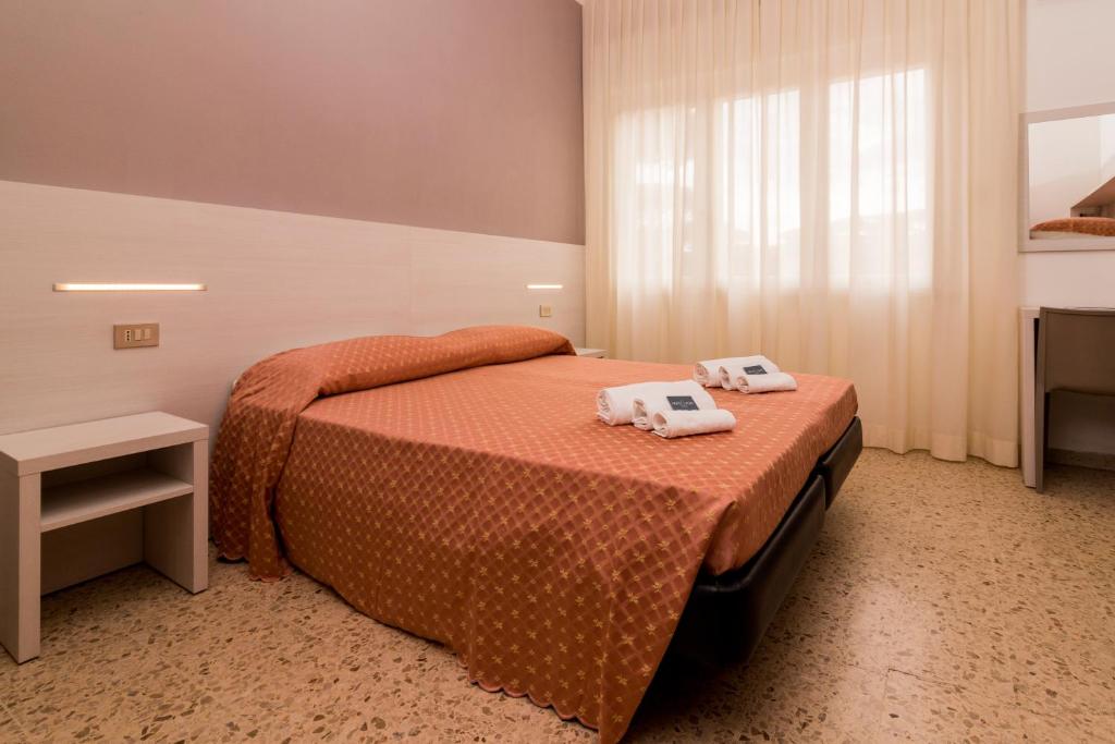Postel nebo postele na pokoji v ubytování Hotel Lydia