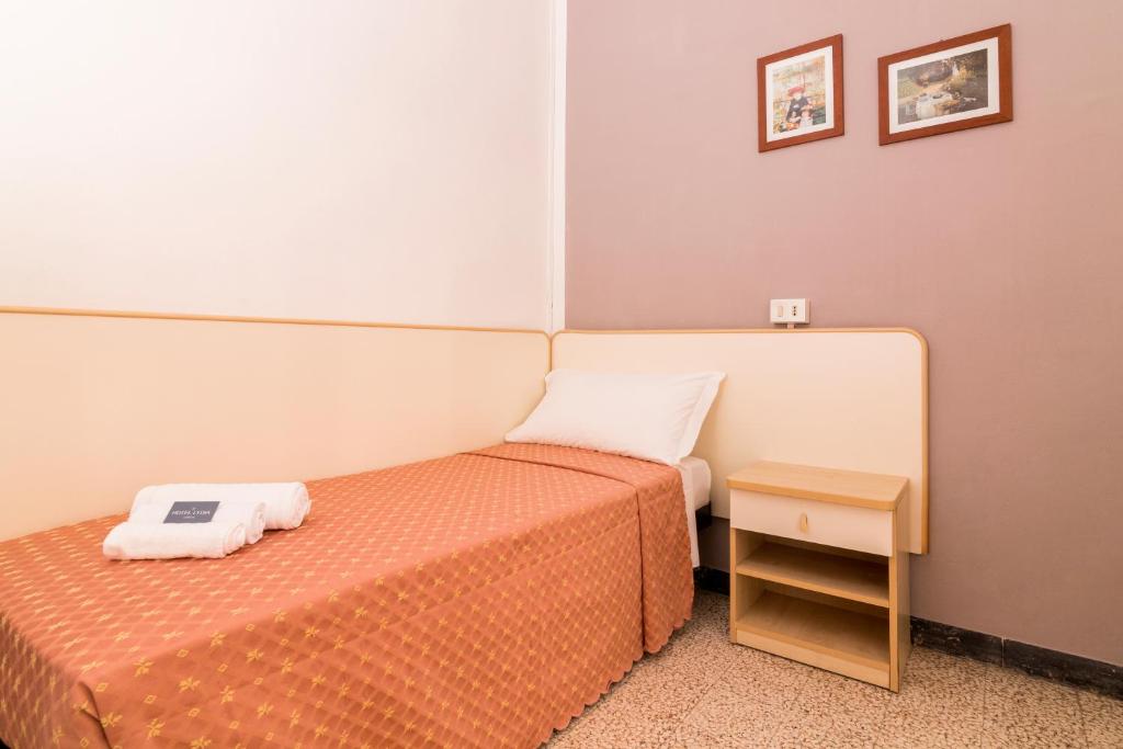 Postel nebo postele na pokoji v ubytování Hotel Lydia