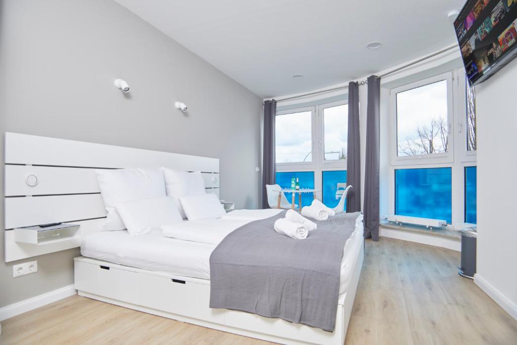 Postel nebo postele na pokoji v ubytování Hamburg Nord Apartments