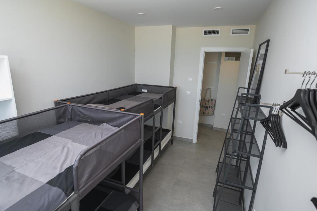 Postel nebo postele na pokoji v ubytování WONDER2SEA - Style & Comfort & Beach - LA MANGA