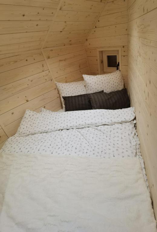 Postel nebo postele na pokoji v ubytování Chalet Velika Planina - I FEEL ALPS