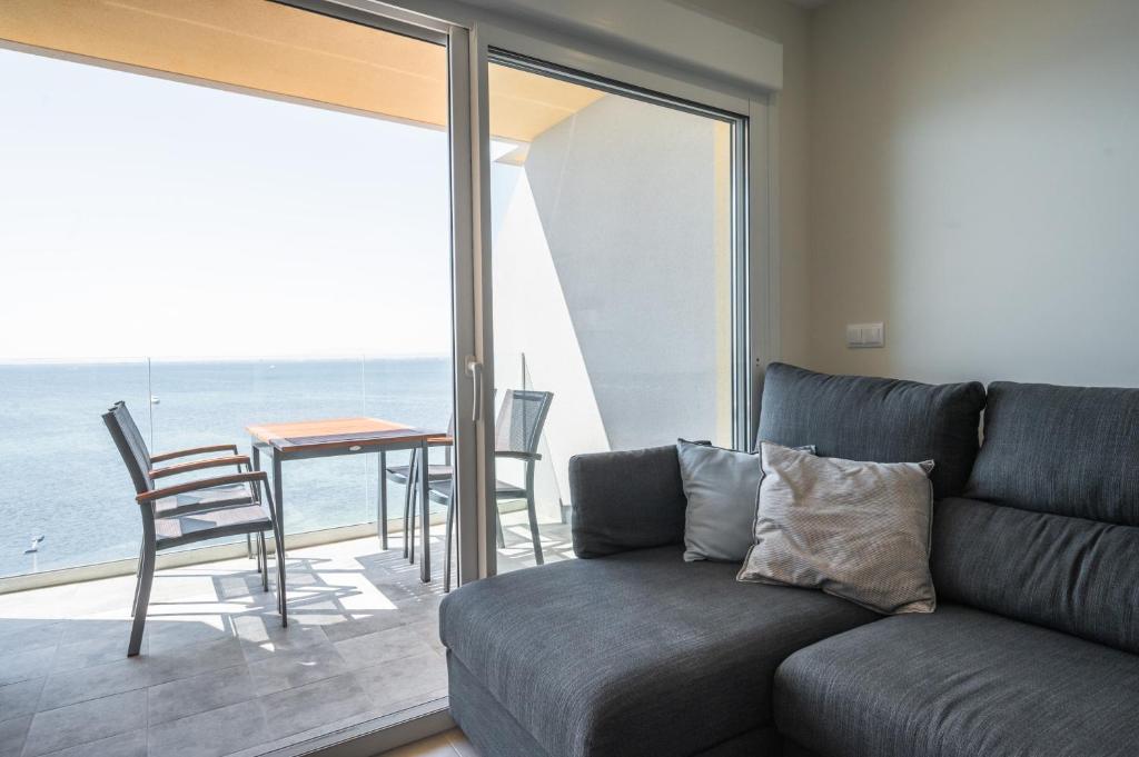 Posezení v ubytování WONDER2SEA - Style & Comfort & Beach - LA MANGA