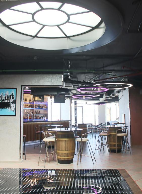 Un restaurante u otro lugar para comer en Al Diar Dana Hotel