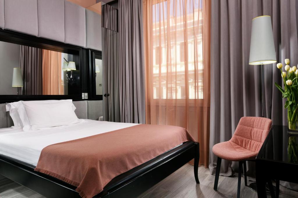 Posteľ alebo postele v izbe v ubytovaní Leon's Place Hotel In Rome