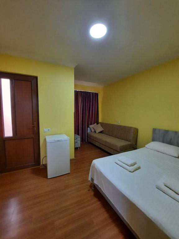 Postel nebo postele na pokoji v ubytování Delta Hotel