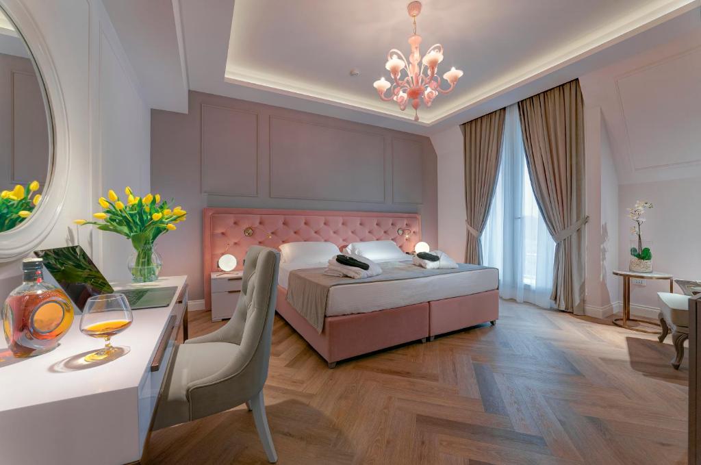 Postel nebo postele na pokoji v ubytování Hotel Premiere Abano