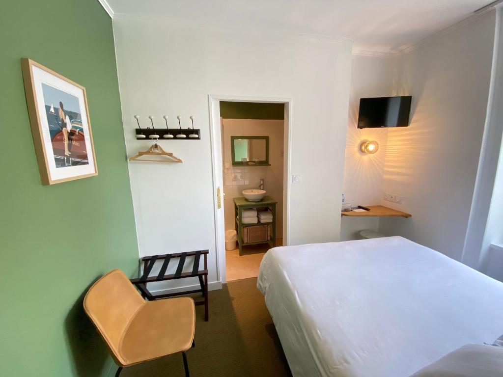 TV a/nebo společenská místnost v ubytování Hotel du Parc