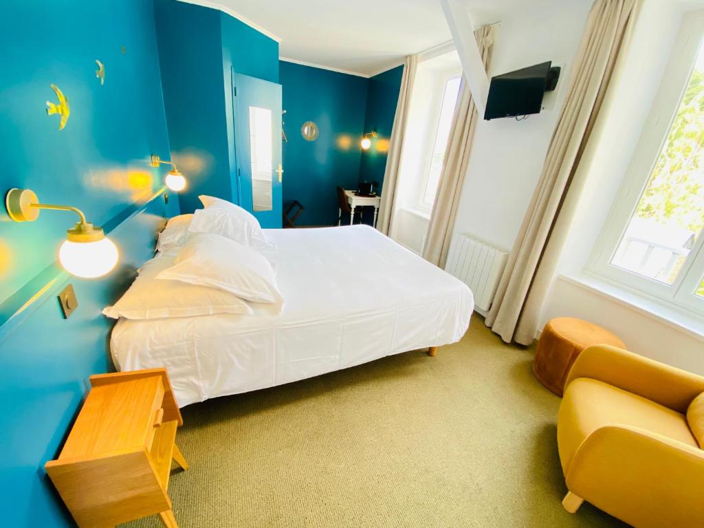 Postel nebo postele na pokoji v ubytování Hotel du Parc