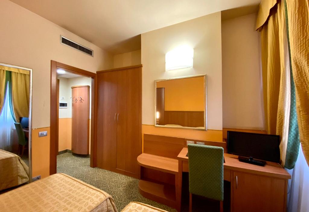 Postel nebo postele na pokoji v ubytování Hotel Kristall