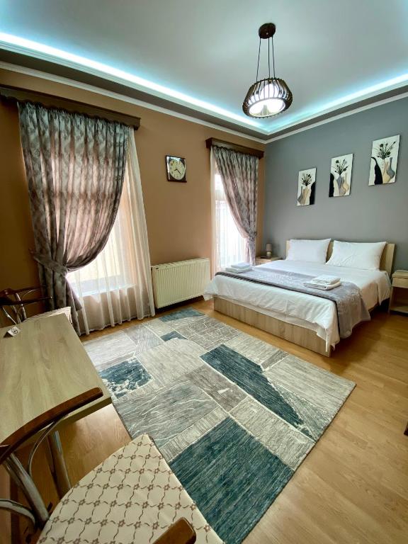 Postel nebo postele na pokoji v ubytování Vila A Hotel