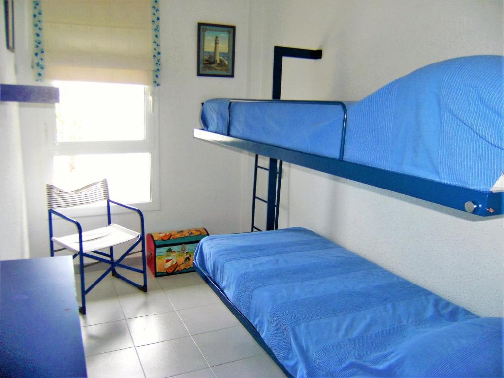 Posteľ alebo postele v izbe v ubytovaní Illa Mar Dor 128