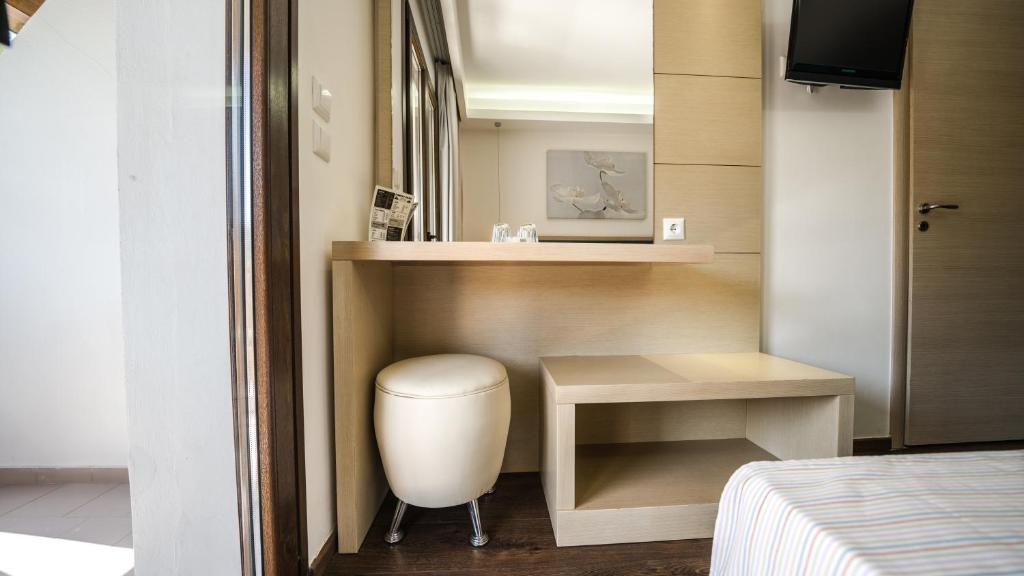 Postel nebo postele na pokoji v ubytování Forest Park Hotel