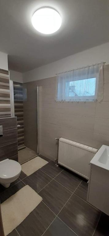 Koupelna v ubytování Hajnalka vendégház
