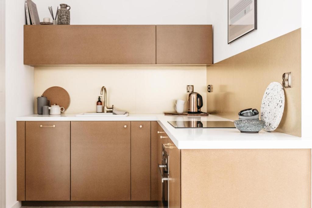 Kuchyňa alebo kuchynka v ubytovaní Powder Apartment - LoftAffair