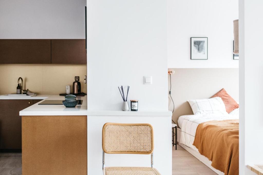 Posteľ alebo postele v izbe v ubytovaní Powder Apartment - LoftAffair