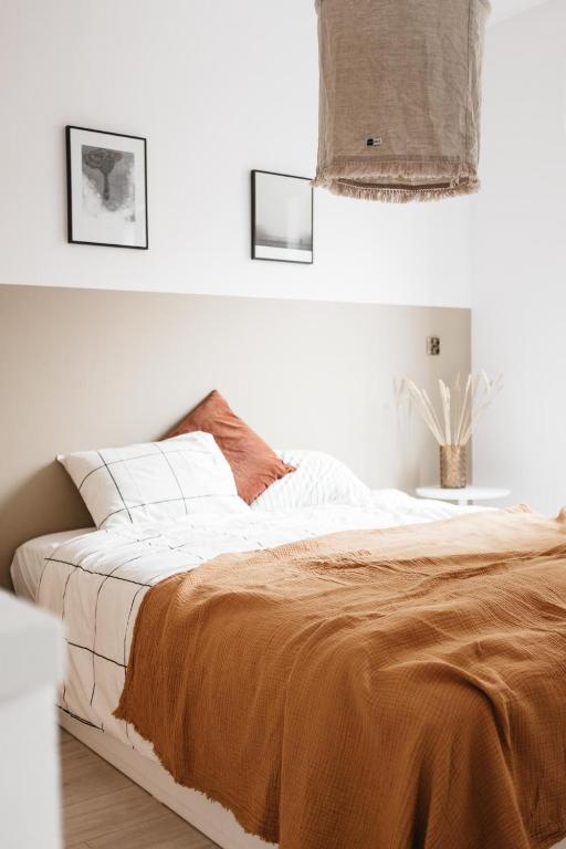 Posteľ alebo postele v izbe v ubytovaní Powder Apartment - LoftAffair