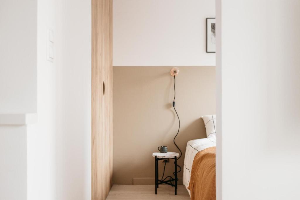 Posteľ alebo postele v izbe v ubytovaní Powder Apartment - LoftAffair