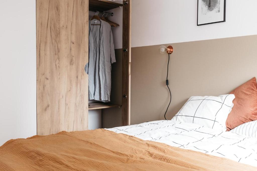 Posteľ alebo postele v izbe v ubytovaní Powder Apartment - LoftAffair